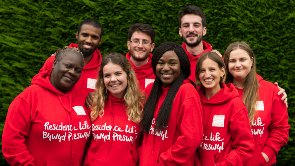 a group of people posing for a photo