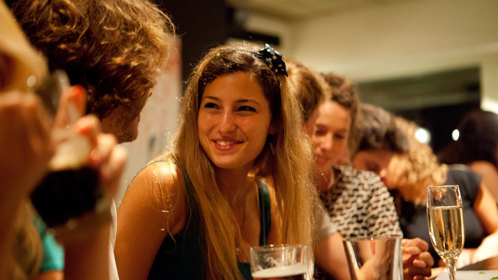 a woman holding a wine glass