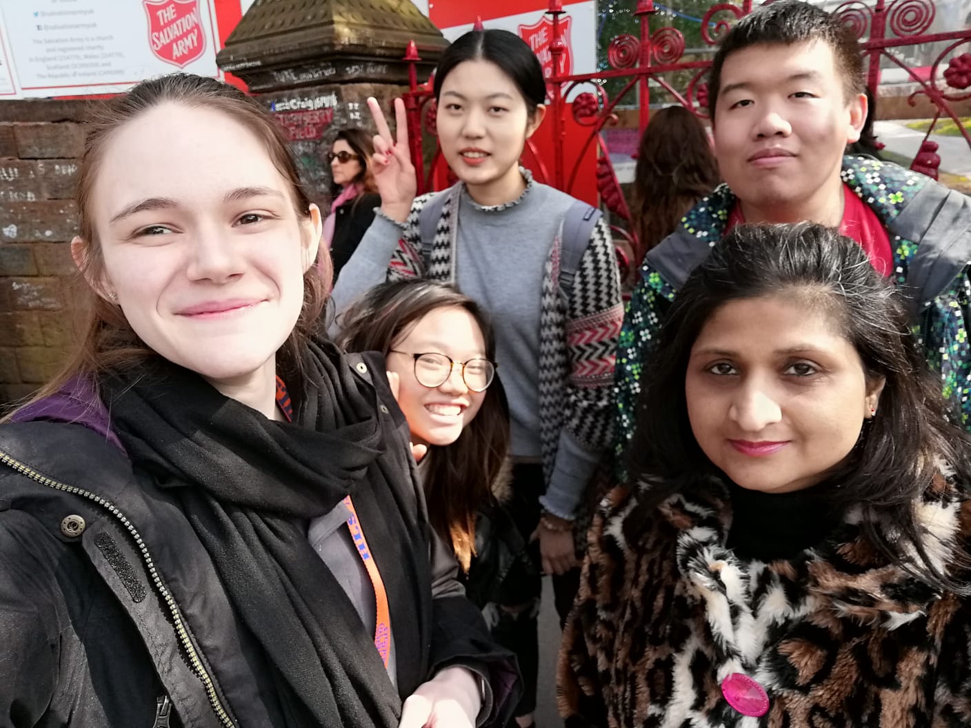 a group of people posing for a photo