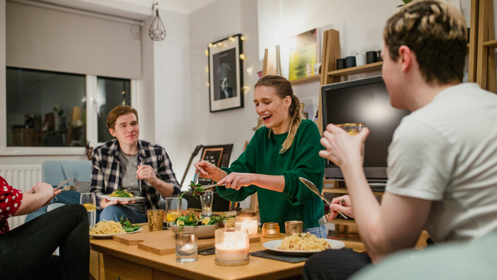 a group of people sitting at a table