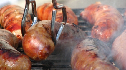 a close up of a metal pan filled with food