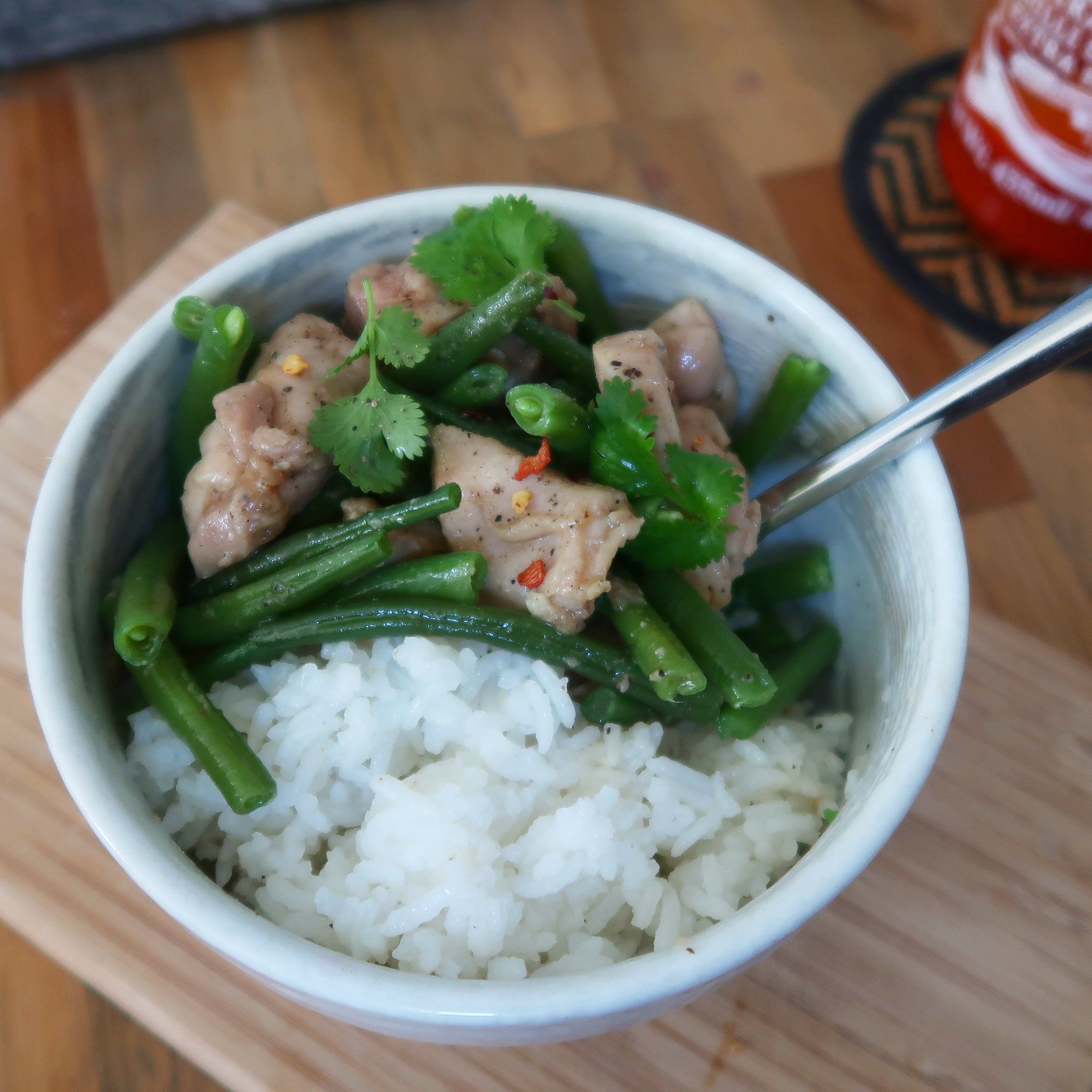 a bowl of food with chicken