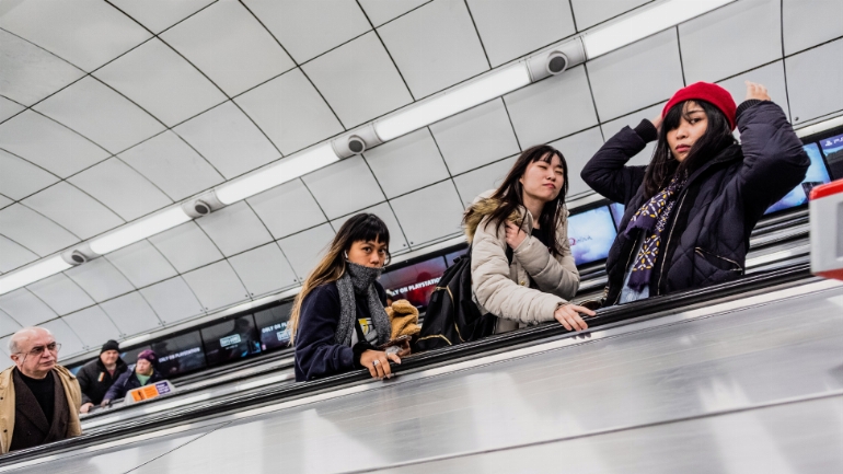 a group of people at a train station