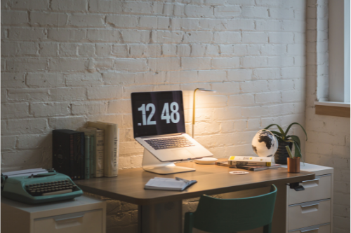 a desk with a lamp