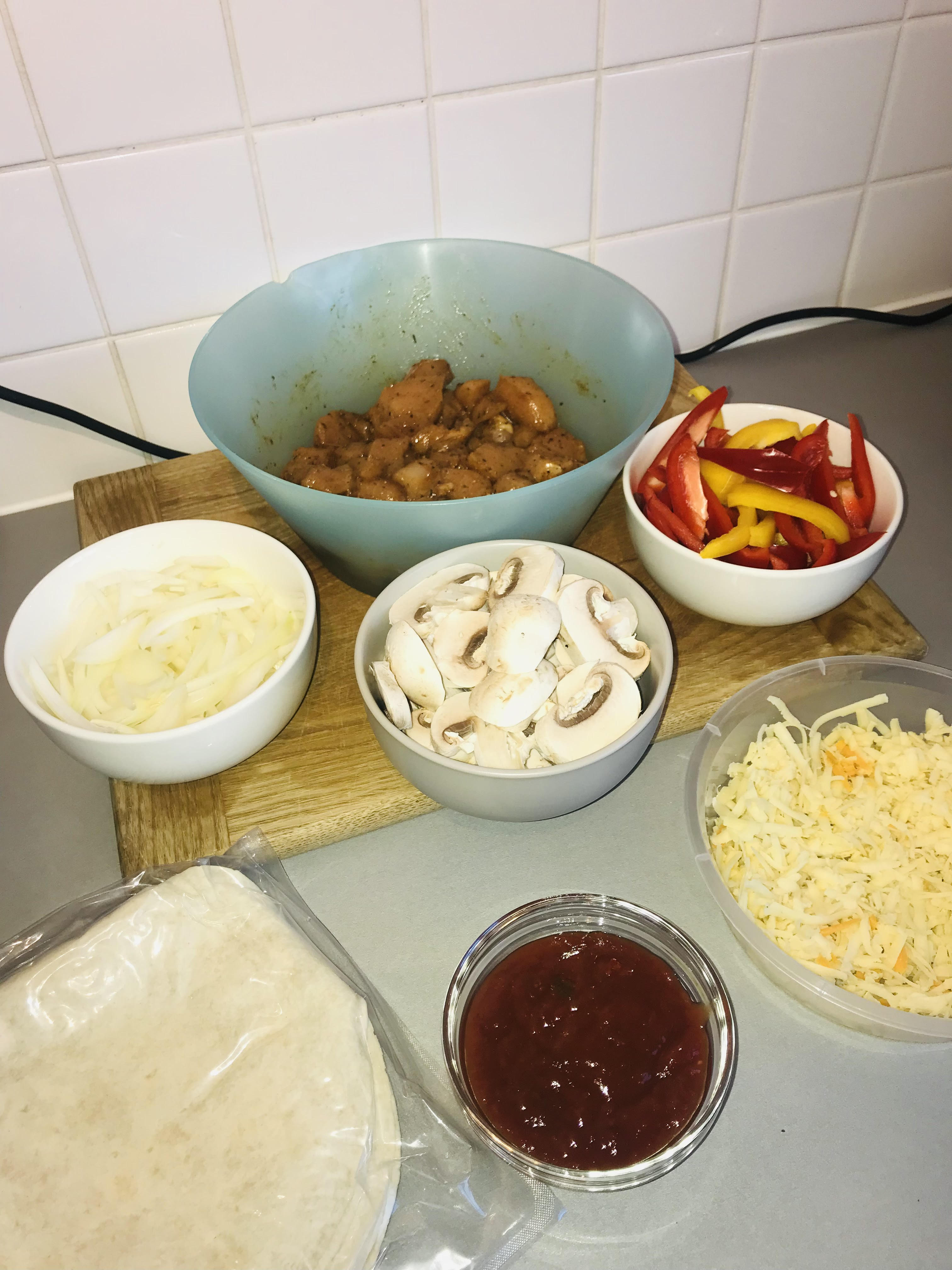 a bowl filled with different types of food on a table