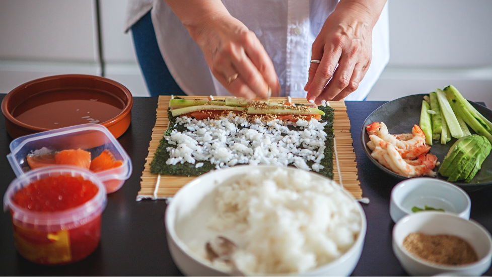 a person making sushi