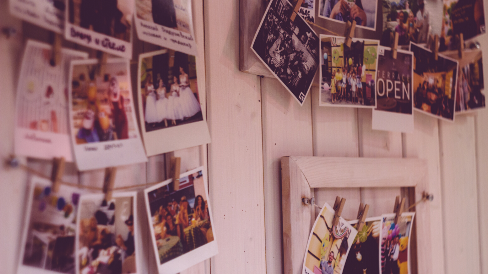 polaroid photos on a wall