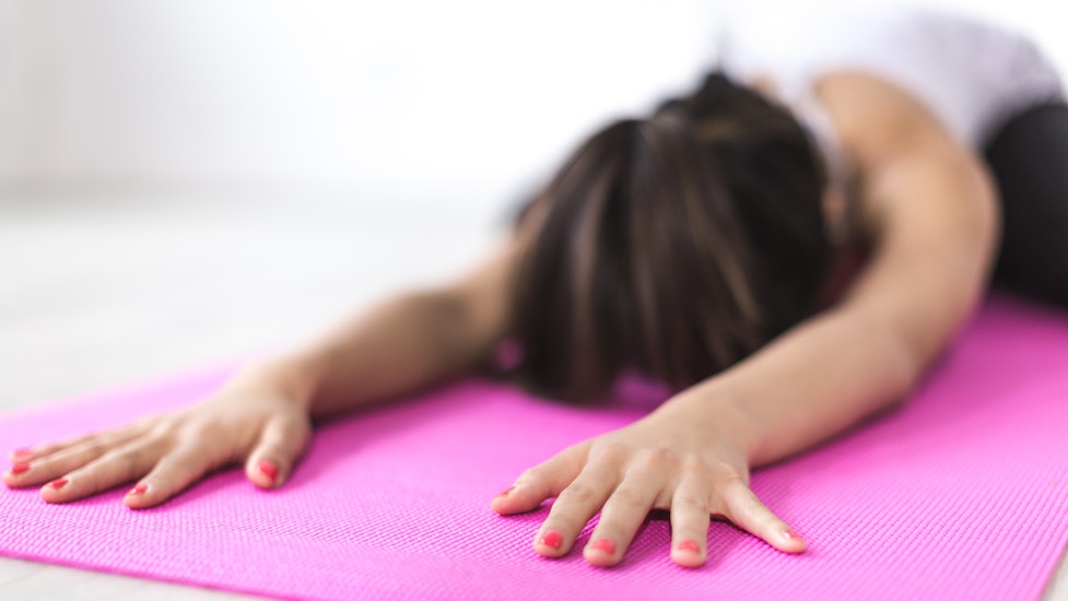 a girl doing yoga