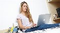 a woman sitting at a computer