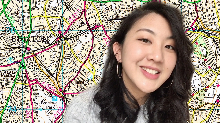 a woman holding a map