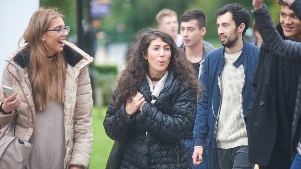 a group of people posing for the camera