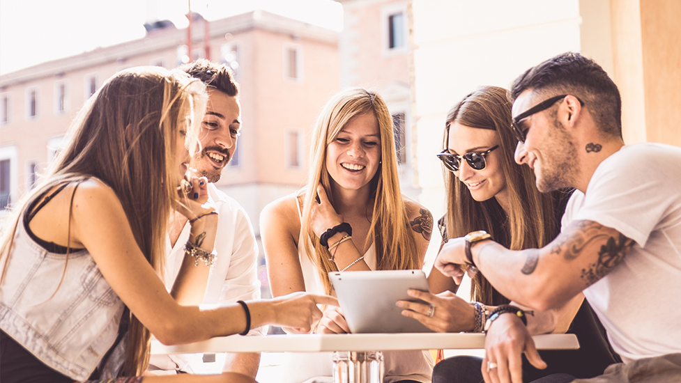 a group of people around each other