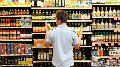 a person standing in front of a store