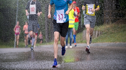 People running on a country road