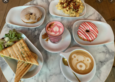 a table topped with plates of food on a plate