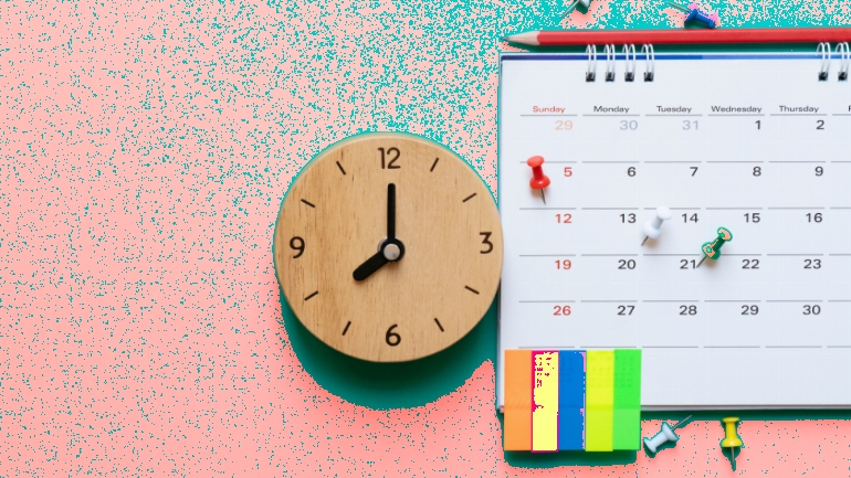 a clock next to a calendar