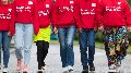 a group people walking towards the camera