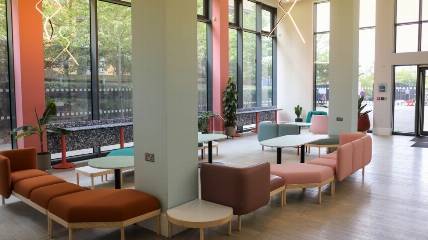 a room filled with furniture and a large window