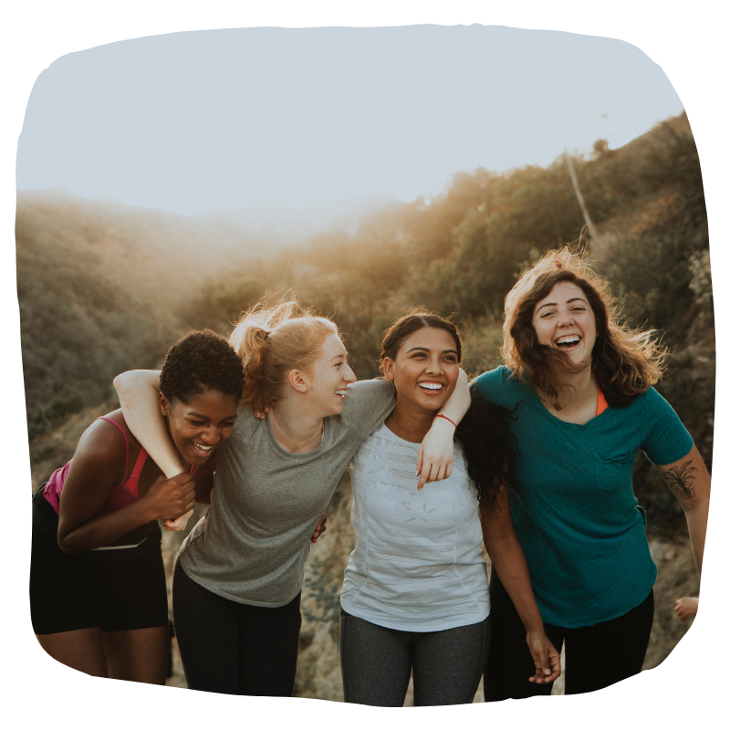 a group of people posing for the camera