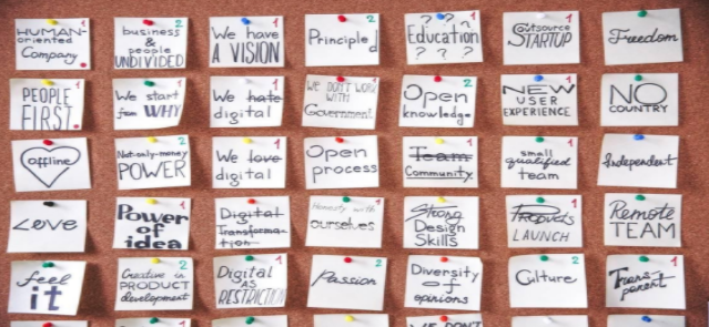 Post-it notes on pin board