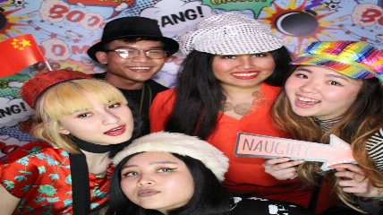 a group of people posing for the camera
