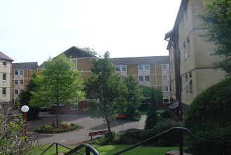 a house with trees in the background