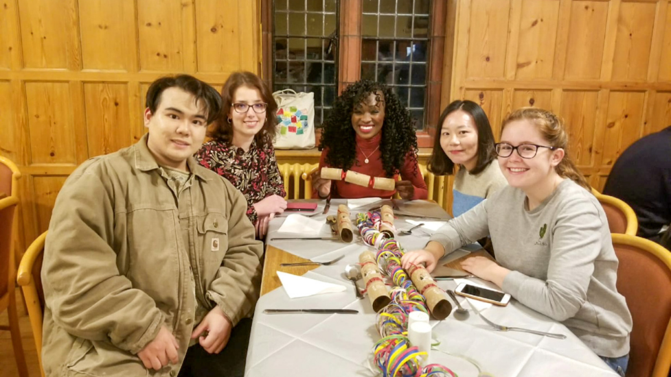 a group of people sitting at a table