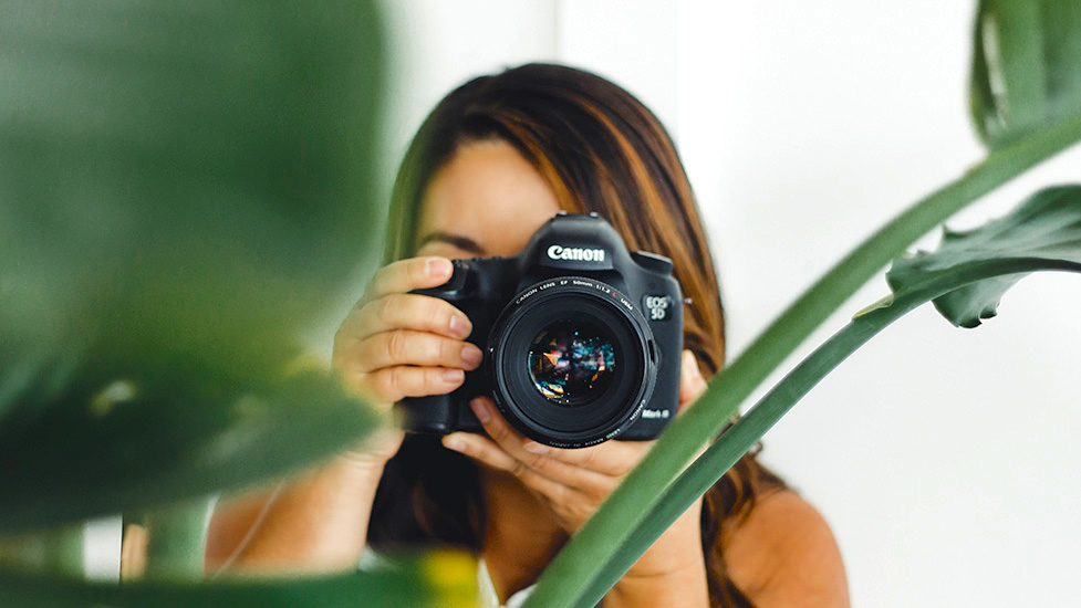 a person holding a camera