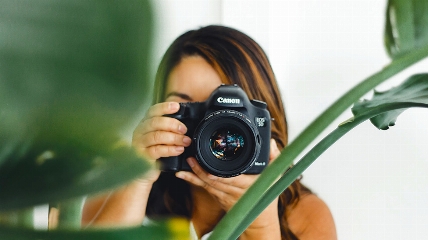 a person holding a camera